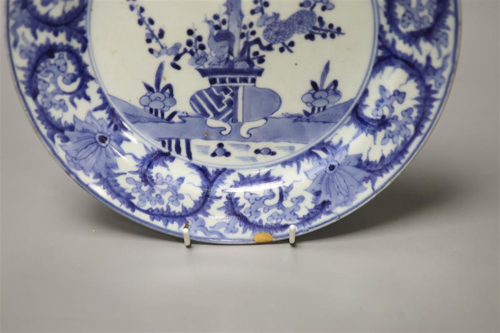 An 18th century Japanese Arita blue and white plate, spurs marks, diameter 26cm